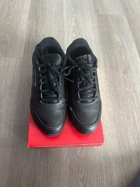 Reebok Men's Black Leather Sneakers with Subtle Branding